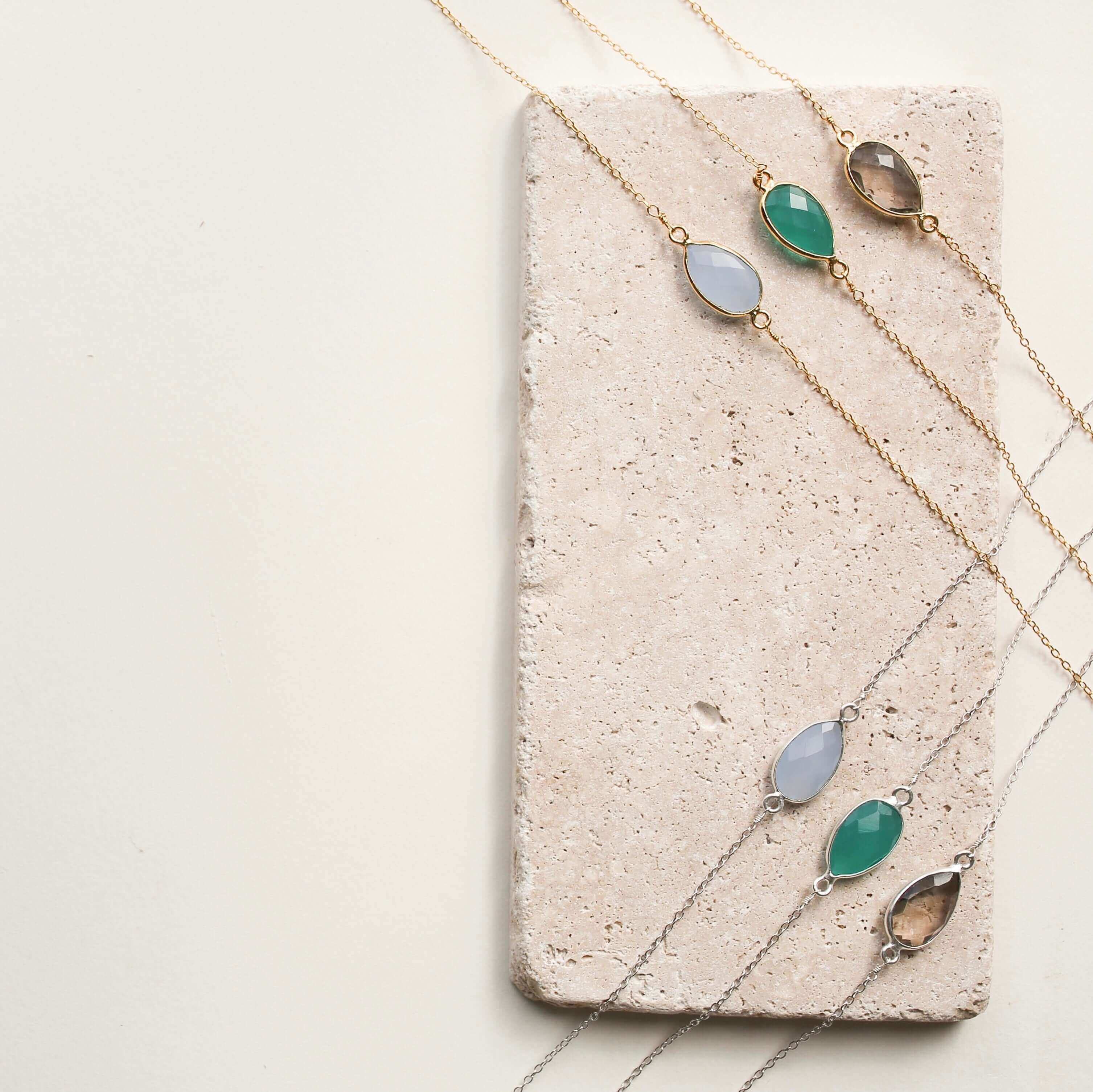 Gold and Silver Necklaces with Colorful Stones