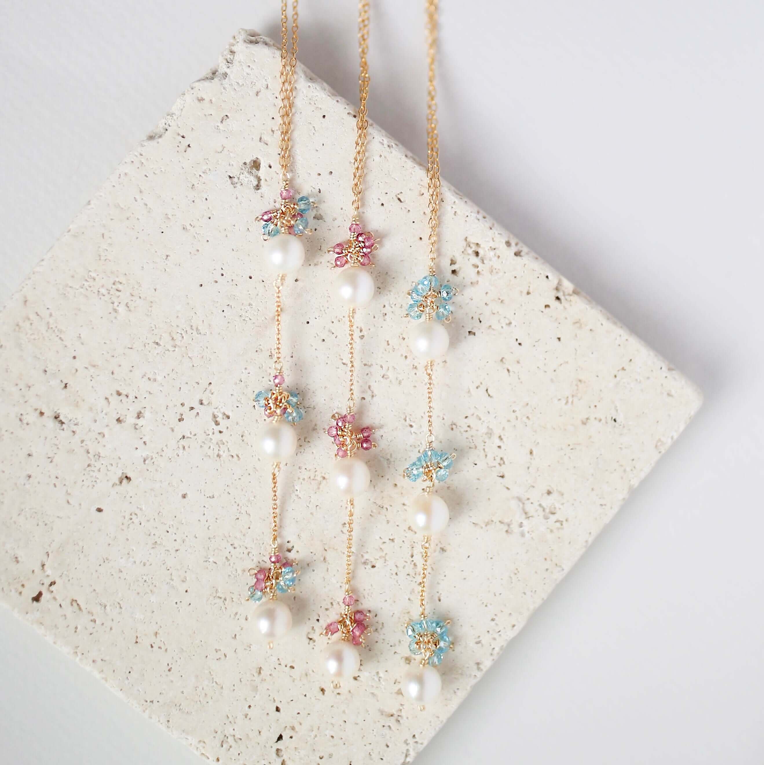 Colorful Gold plated Necklace with 3 white freshwater bead pearls paired with genuine Pink Tourmaline quartz and aquamarine quartz gemstones