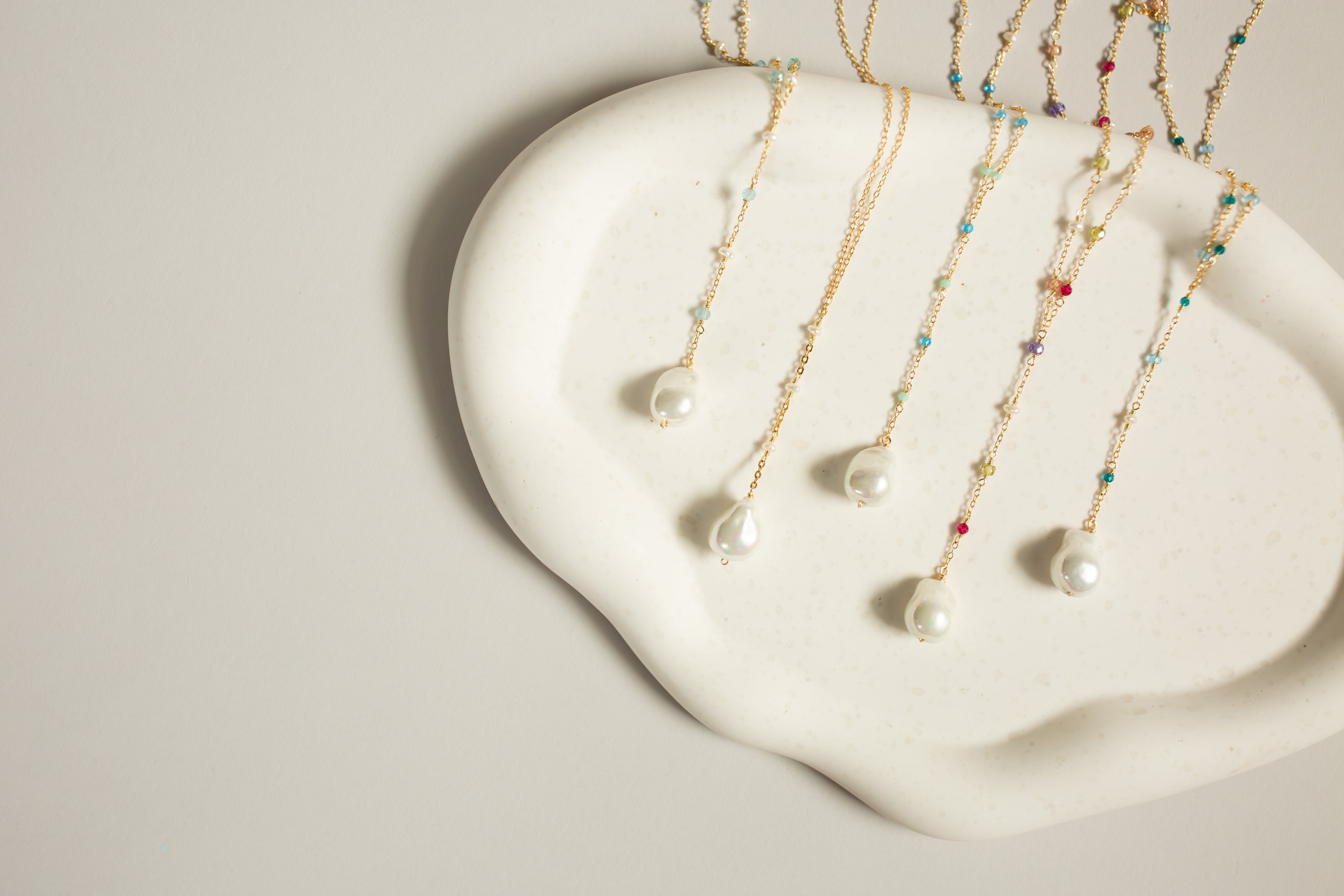 Gold and Silver Gemstone Necklaces