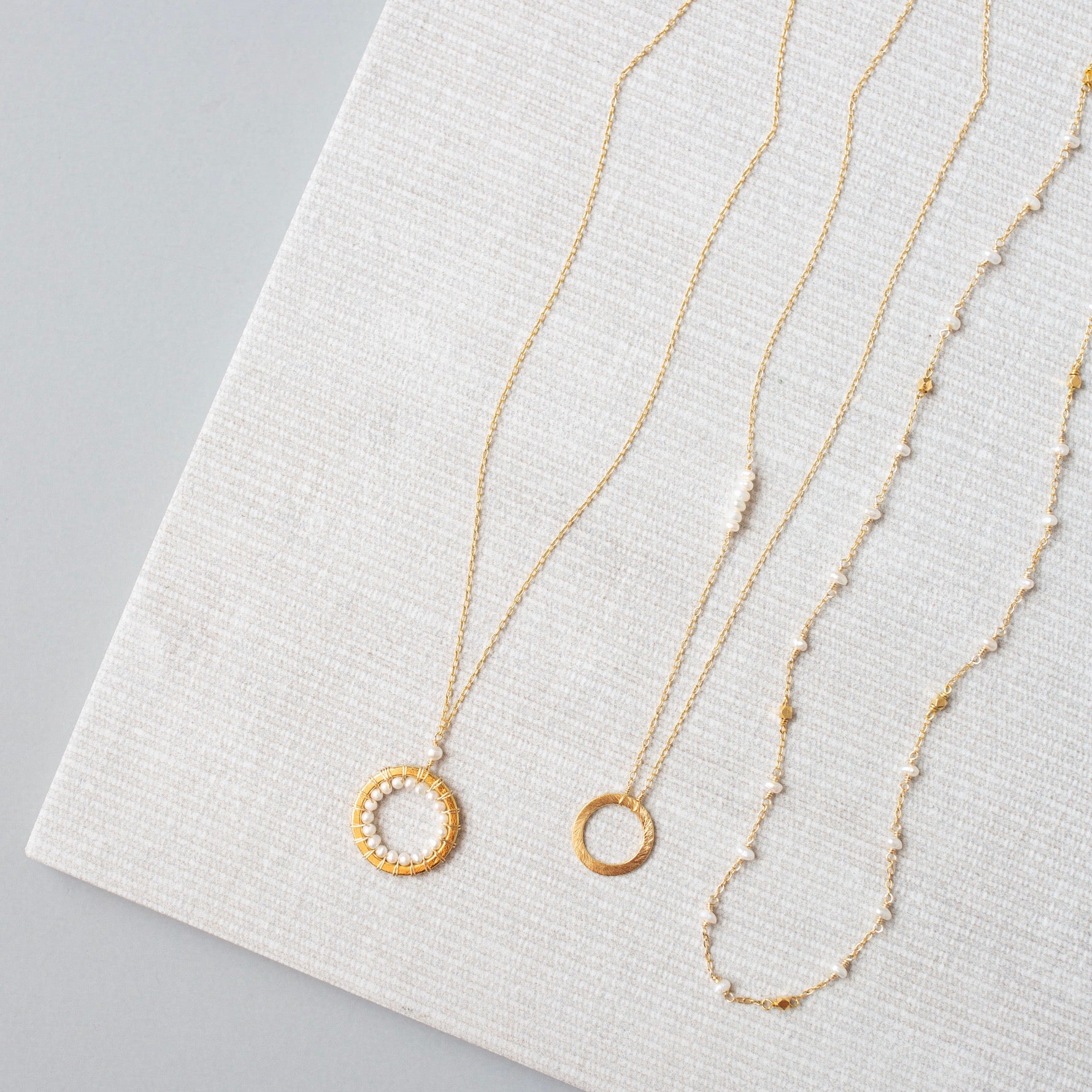 Adjustable Delicate Chain with the Look of Spun Gold features freshwater pearls