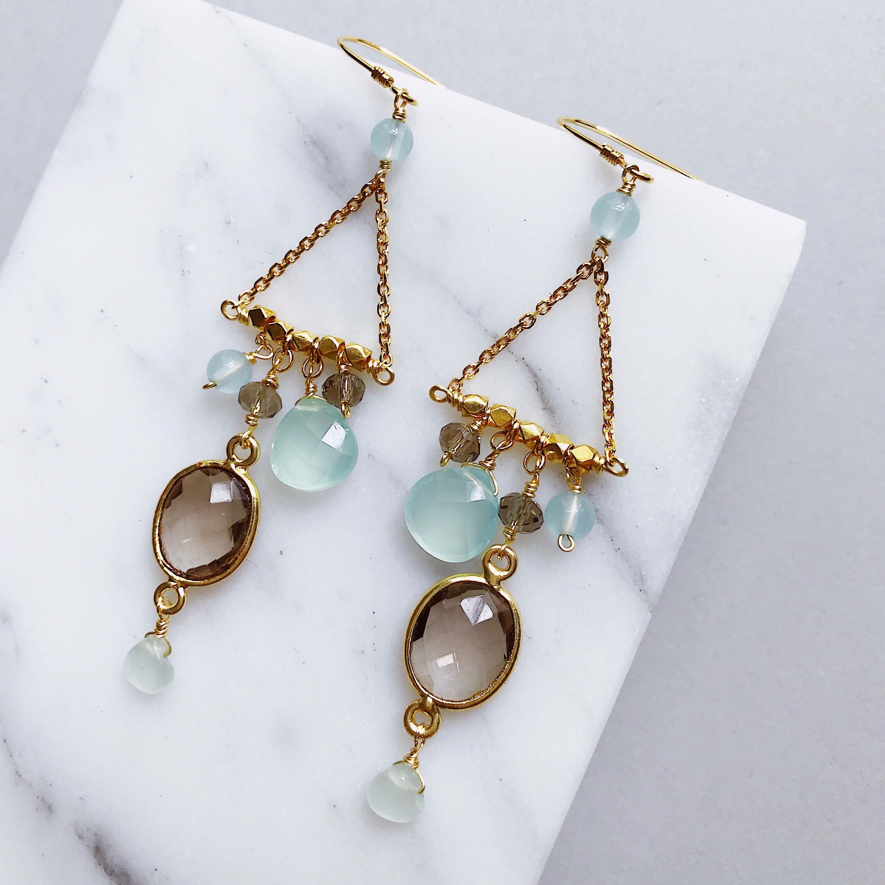 French Hooks, bezel set smoky quartz gemstones surrounded by a variety of faceted aqua chalcedony accent stones Gold pair of Earrings