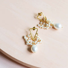 Gold Earrings featuring beautiful white freshwater pearls