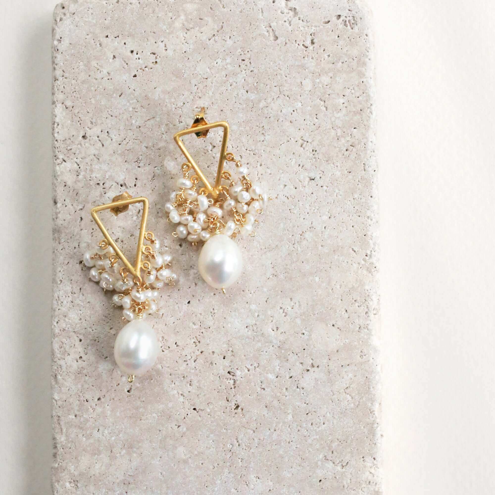 Gold Earrings featuring beautiful white freshwater pearls