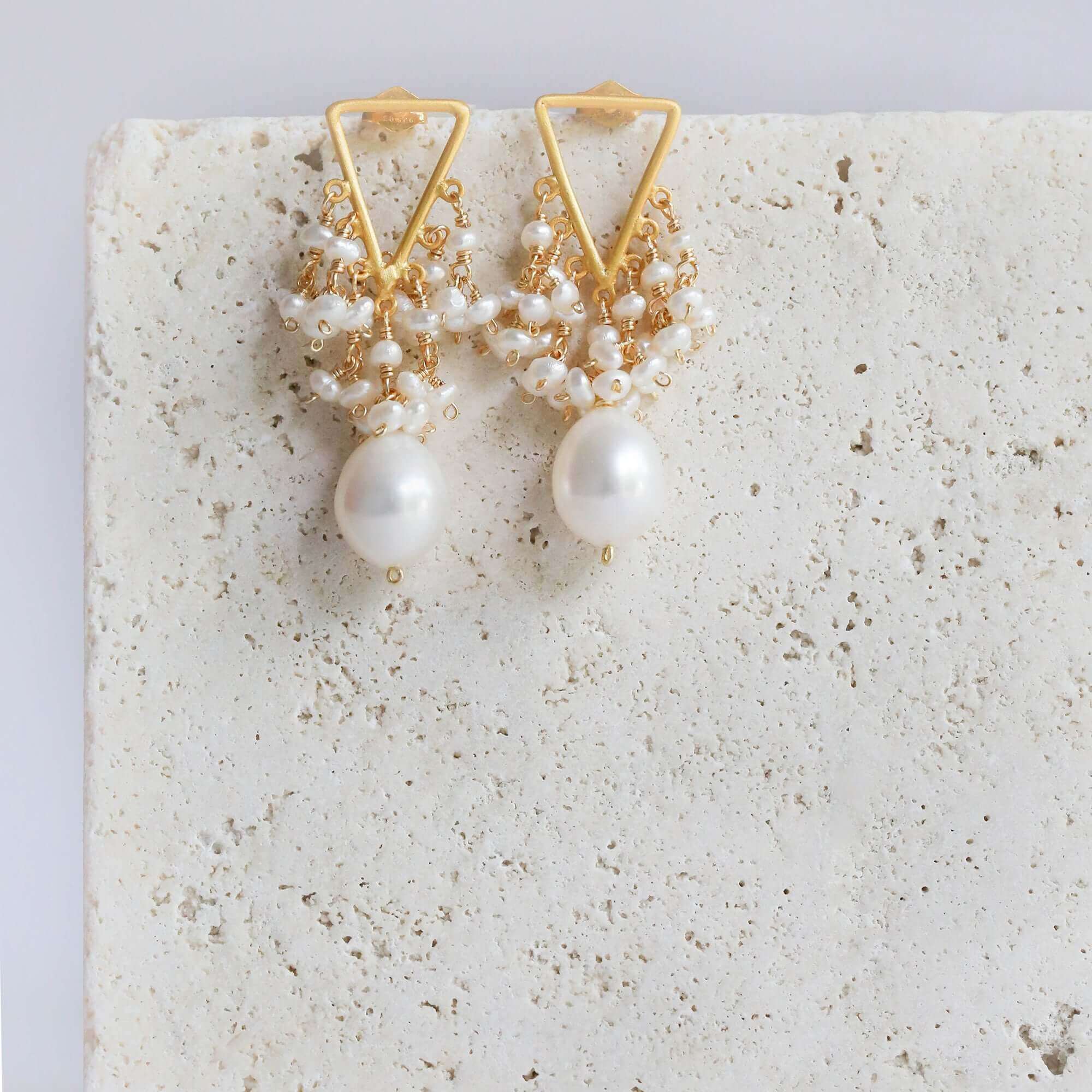 Gold Earrings featuring beautiful white freshwater pearls
