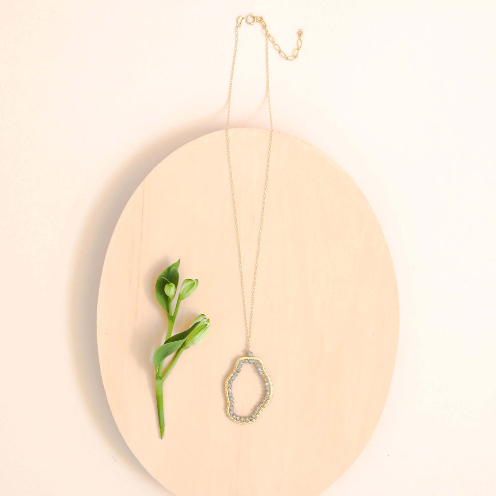 Artisan Crafted: Labradorite Gemstone Gold Pendant.