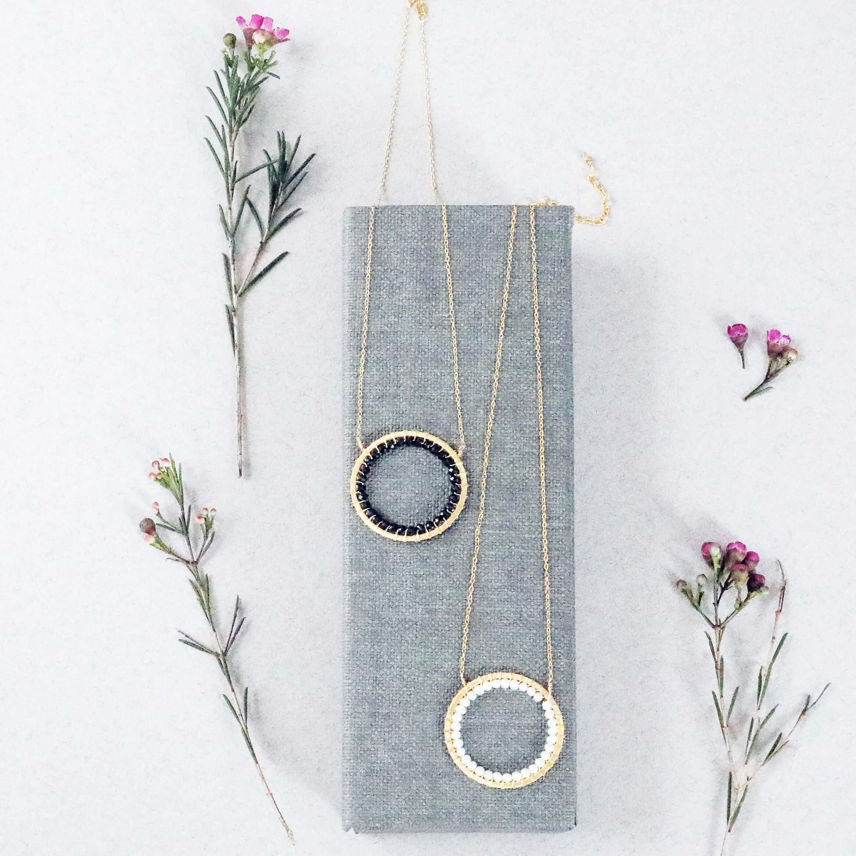 Black Spinel and Pearl Gold Infinity Circle Necklaces