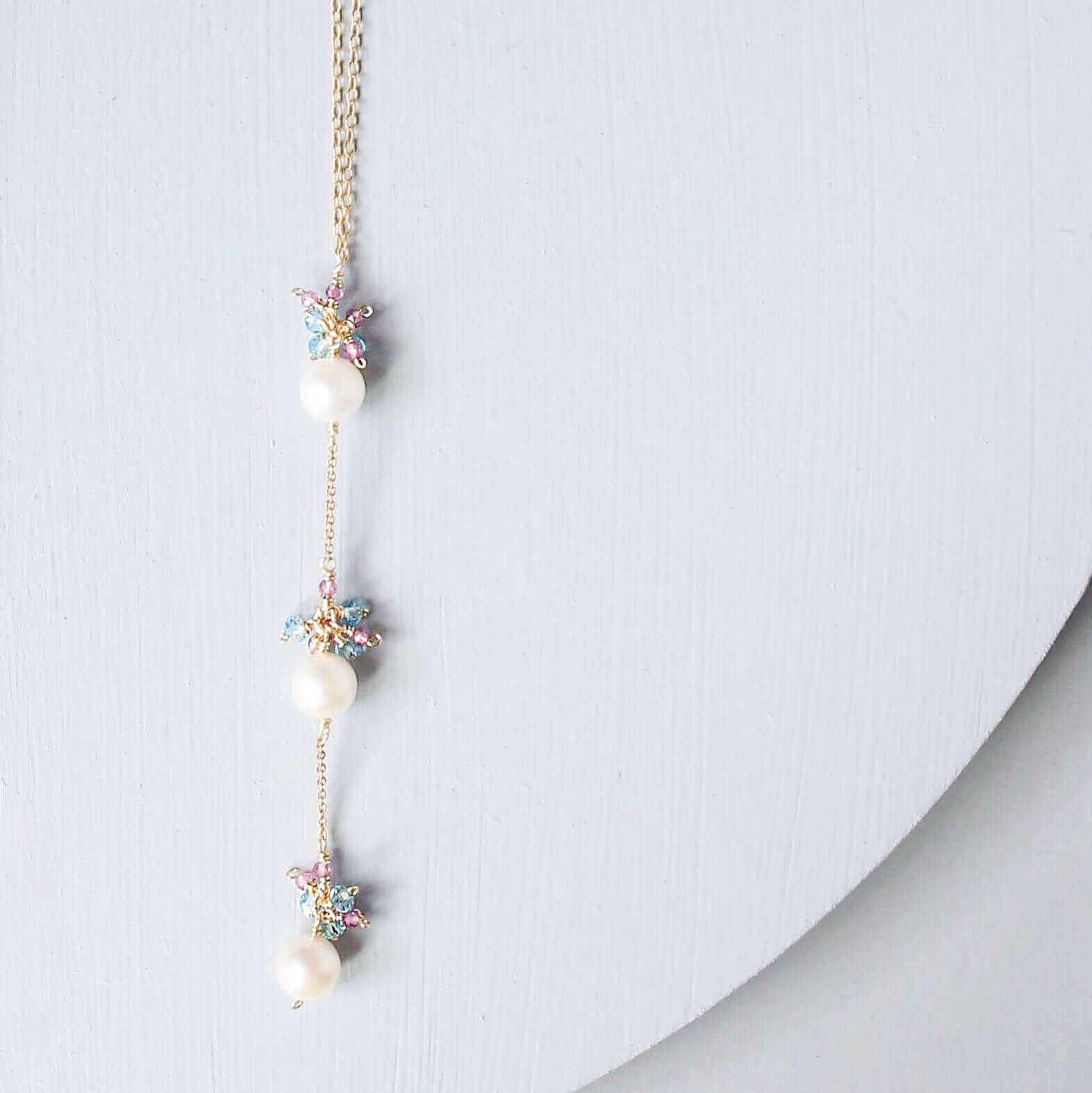 Gold plated Necklace with 3 white freshwater bead pearls paired with genuine rose quartz and aquamarine quartz gemstones