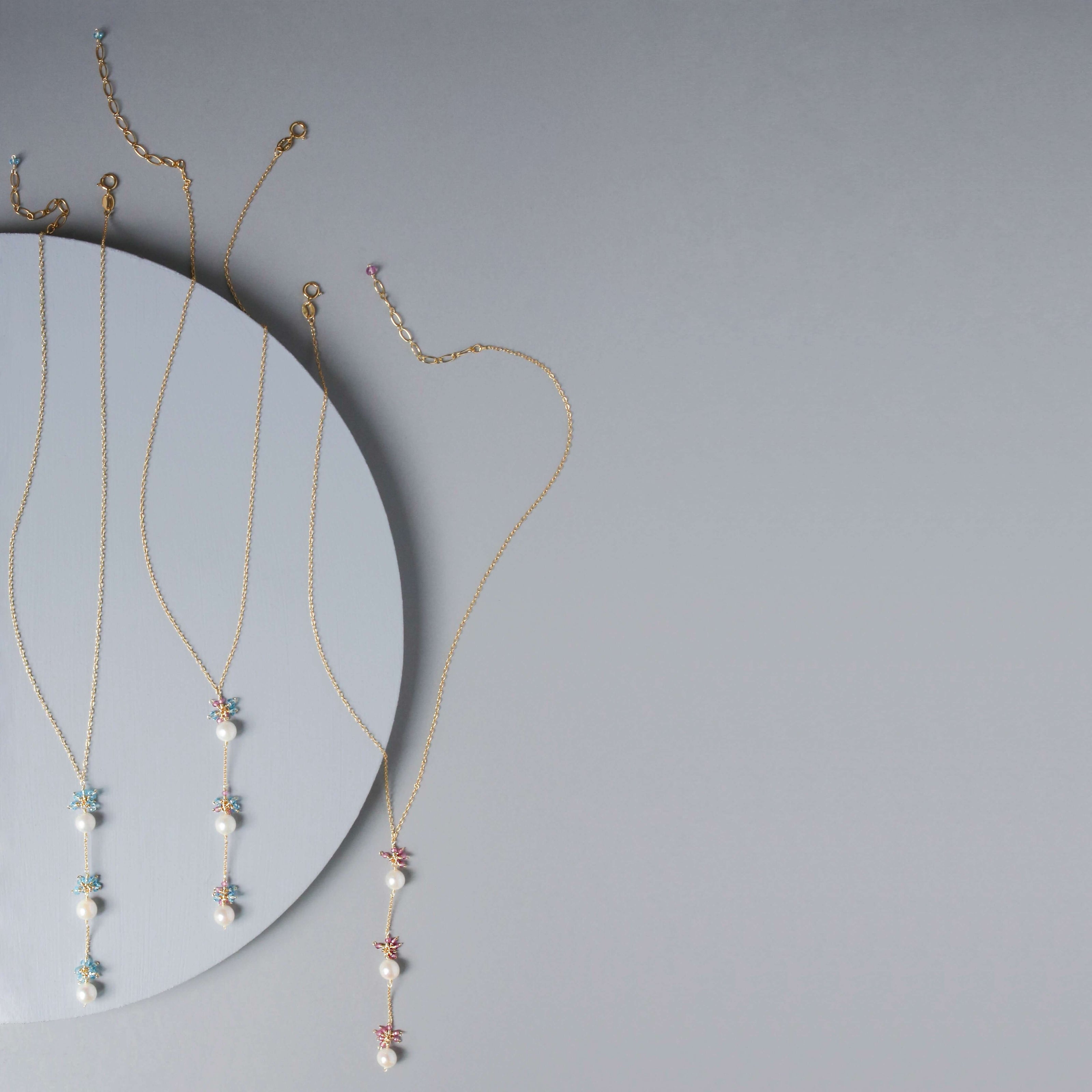 Colorful Gold plated Necklace with 3 white freshwater bead pearls paired with genuine rose quartz and aquamarine quartz gemstones