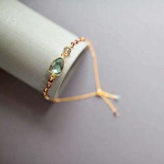 Gold plated Adjustable Bracelet with Green Amethyst Bezel and Tiny Gemstone Accents.