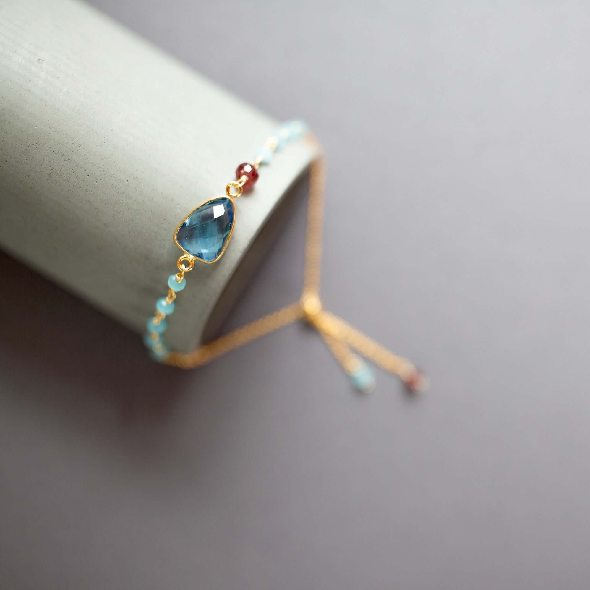 Adjustable stacking bracelet set featuring authentic London Blue Quartz
