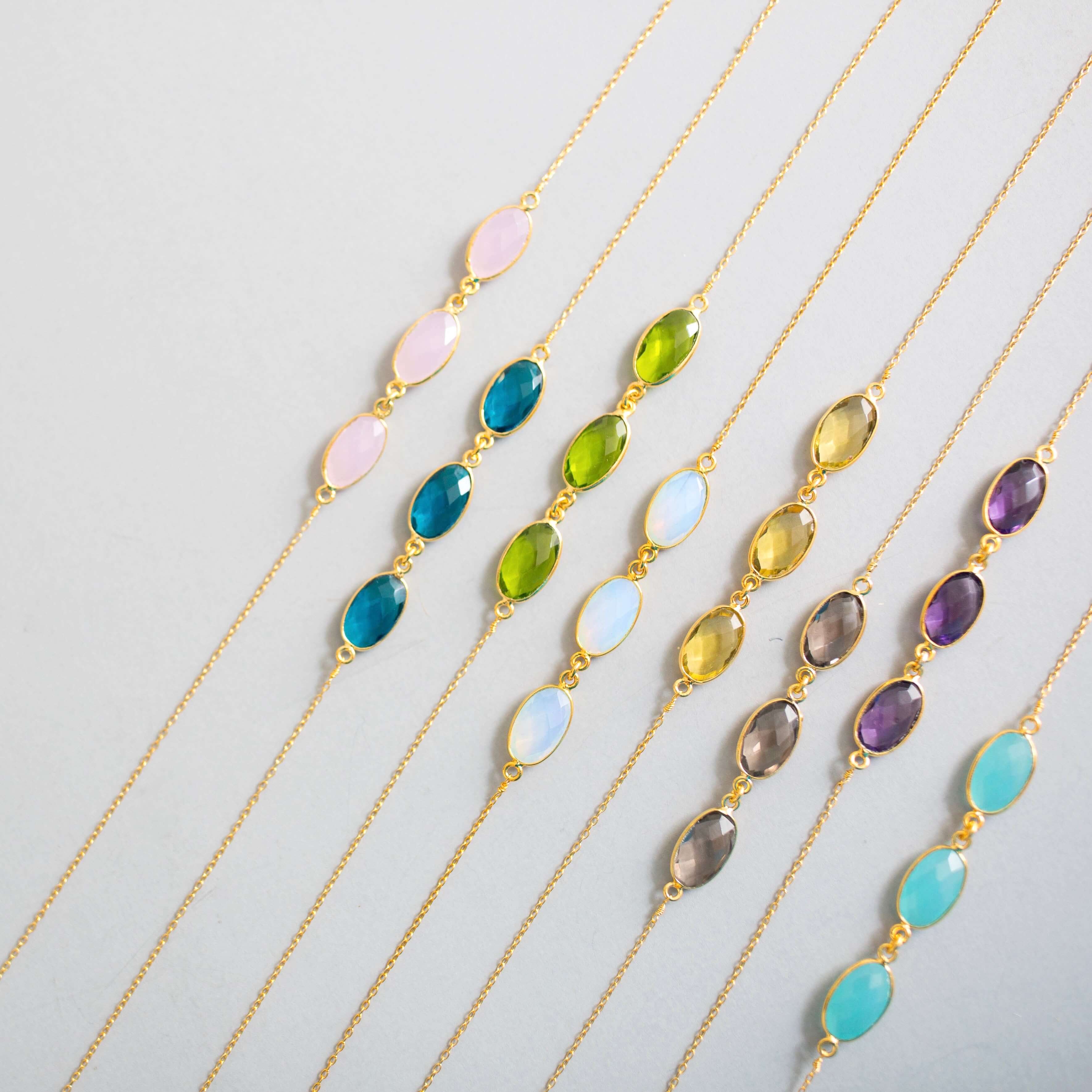 Gold Chic and easy everyday necklace with three bezel-set Colorful gemstones 