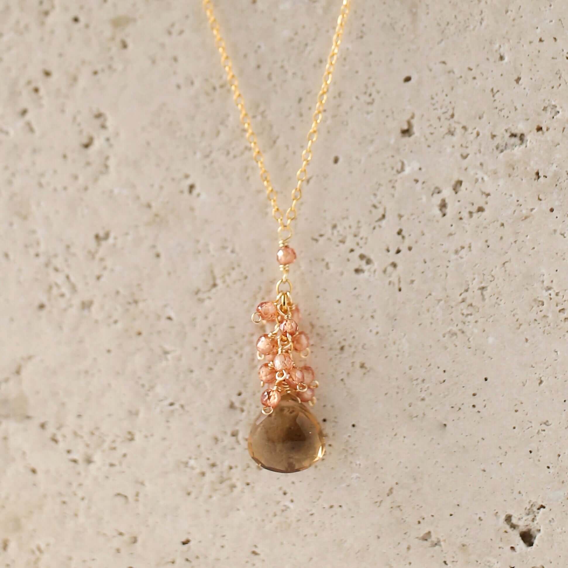 Smoky quartz "raindrop" pendants paired with a cluster of mini champagne quartz gems Gold Necklace