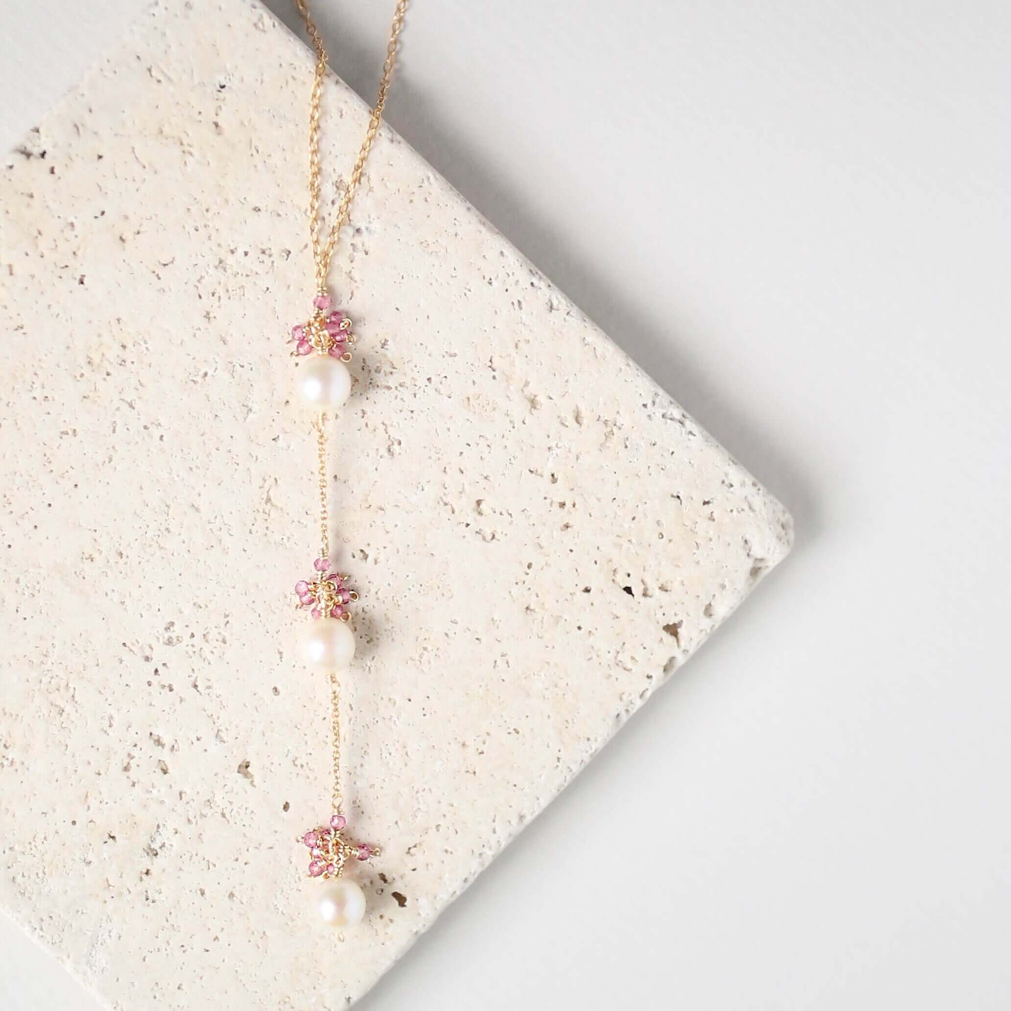 Gold plated Necklace with 3 white freshwater bead pearls paired with genuine rose quartz gemstones