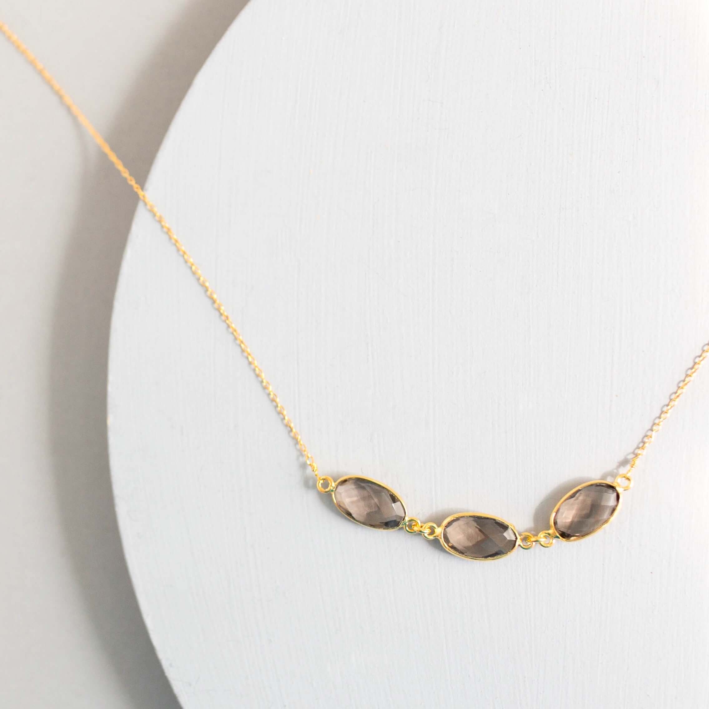 Gold necklace with 3 beautiful bezel-set smoky quartz gemstones