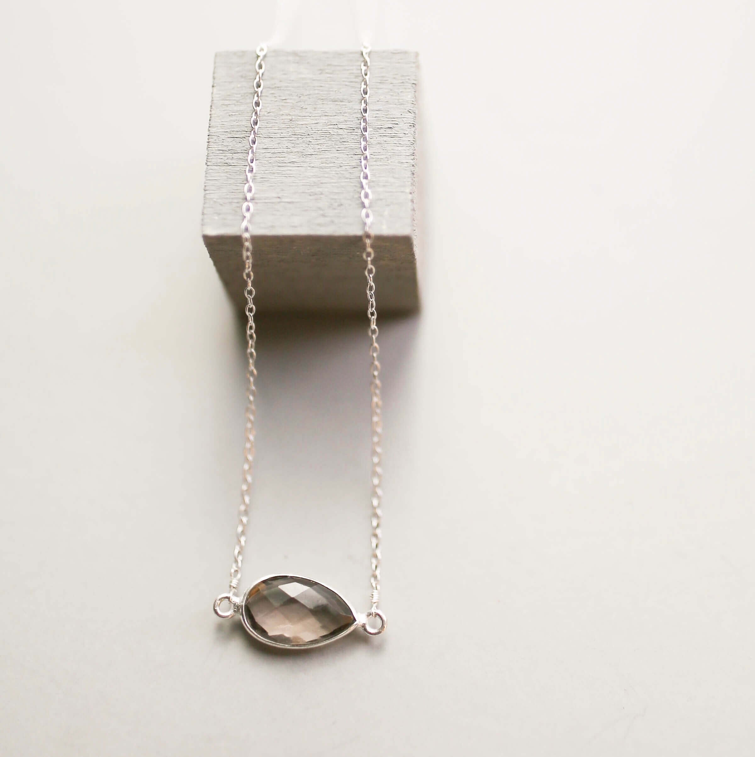 Silver minimalist necklace with a beautiful smoky quartz bezel set stone