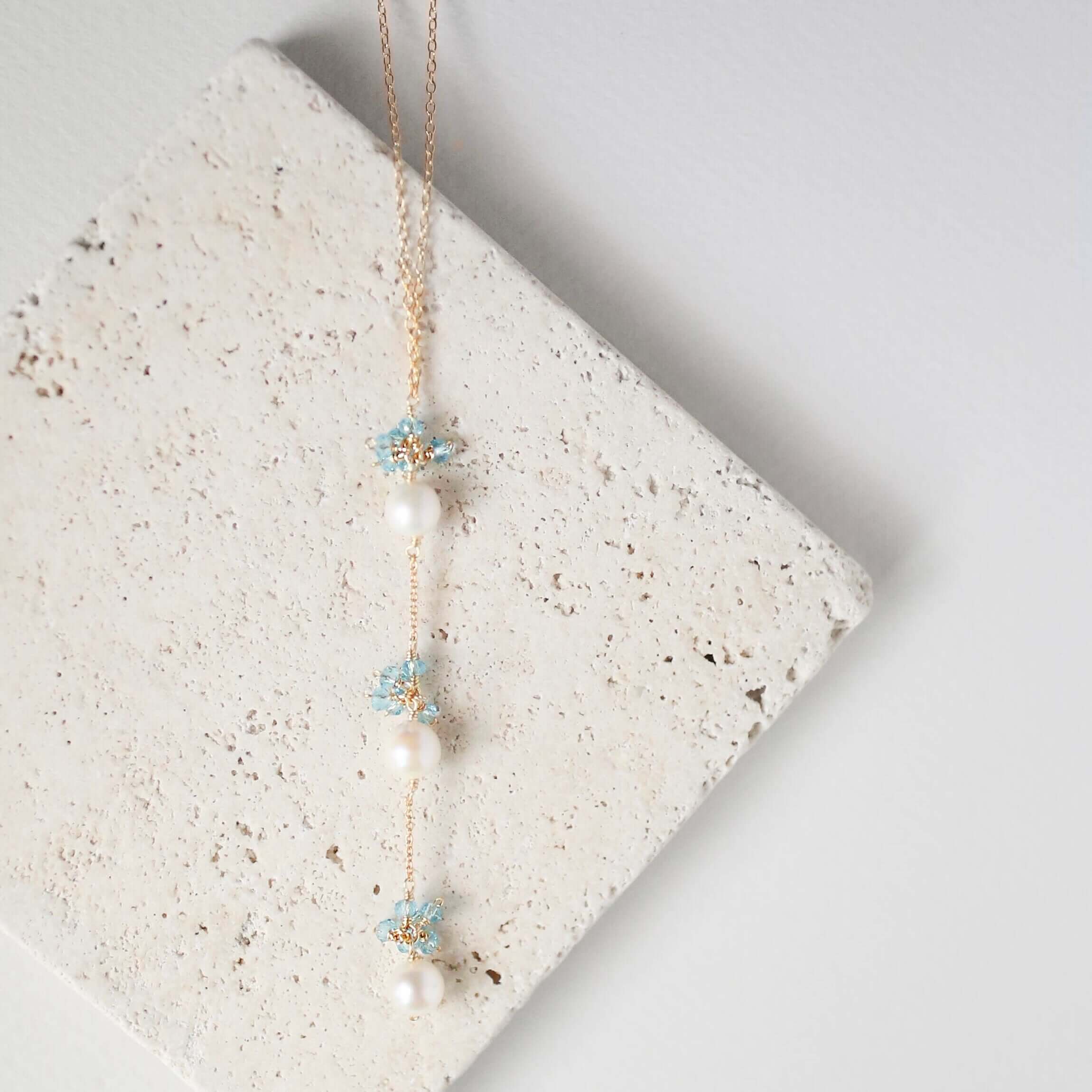 Gold plated Necklace with 3 white freshwater bead pearls paired with genuine aquamarine quartz gemstones