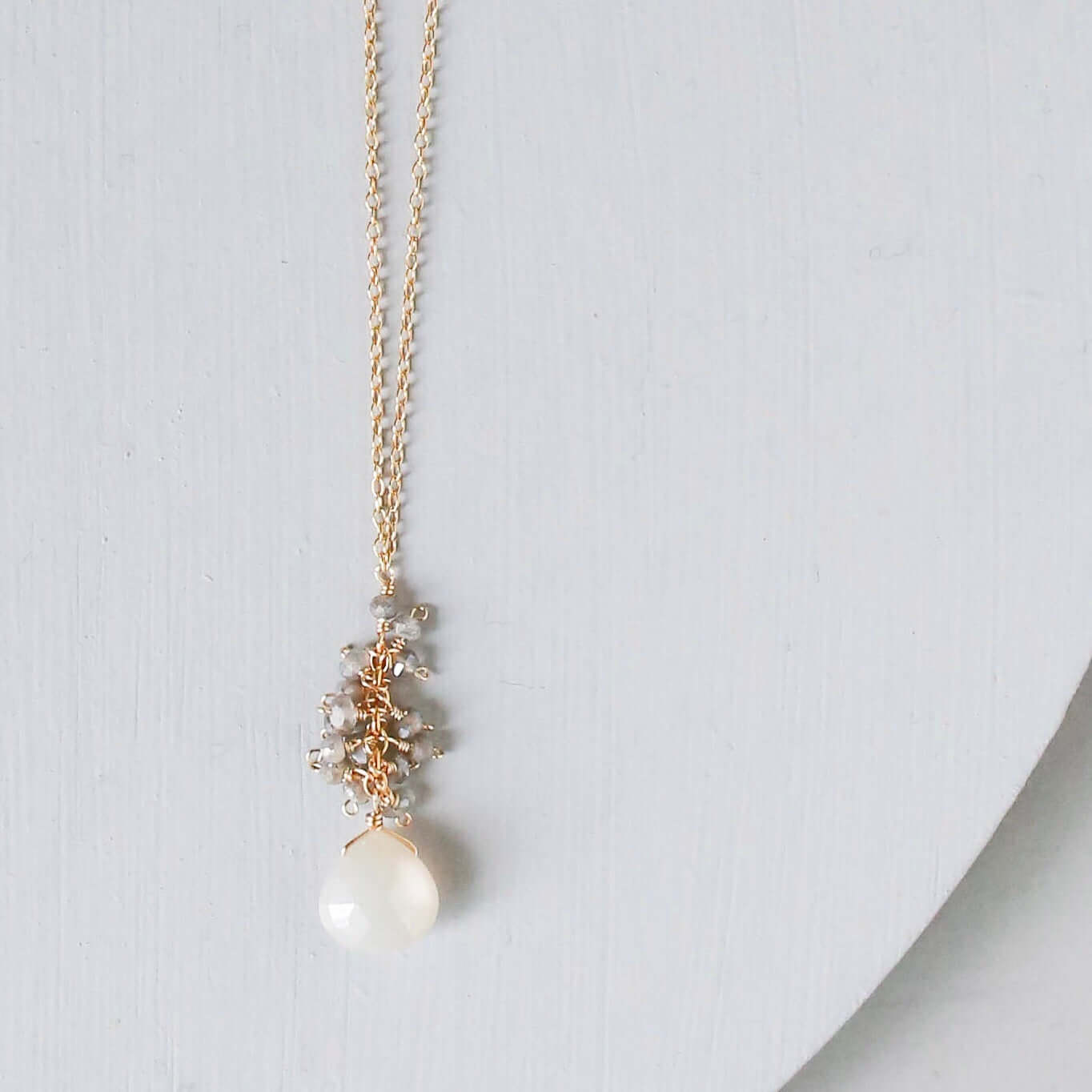 White chalcedony drop pendants paired with a cluster of mini labradorite quartz gems Gold Necklace