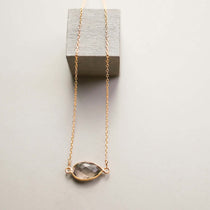 Gold minimalist necklace with a beautiful smoky quartz bezel set stone