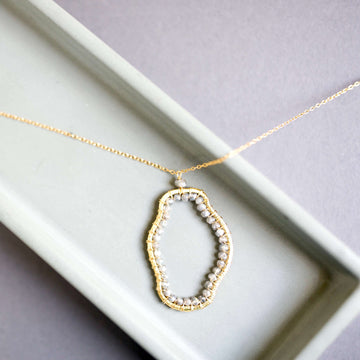 Artisan Crafted: Labradorite Gemstone Gold Pendant.