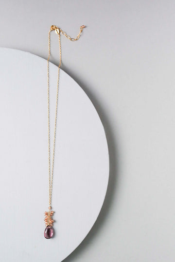Vibrant rhodolite garnet gemstones paired with a cluster of mini champagne quartz gems Gold Necklace