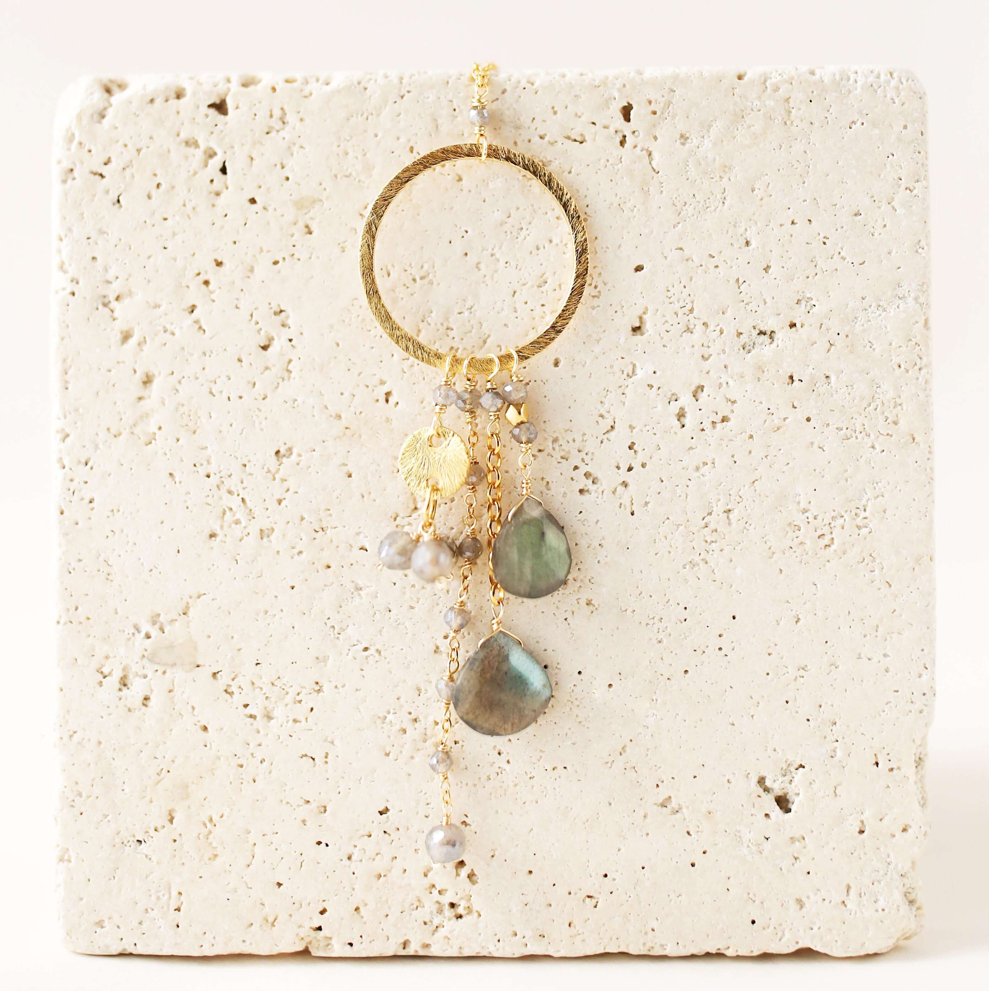 Multiple strands of lush gems sparkle on a hoop with labradorite gemstone Pendant Gold Necklace