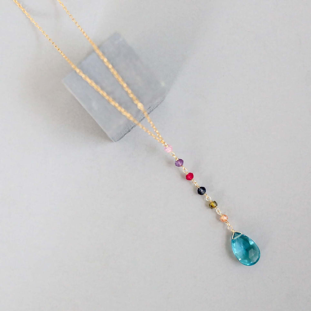Gold Yoga pendant with neon blue quartz gemstones, multi-color accent stones Necklace