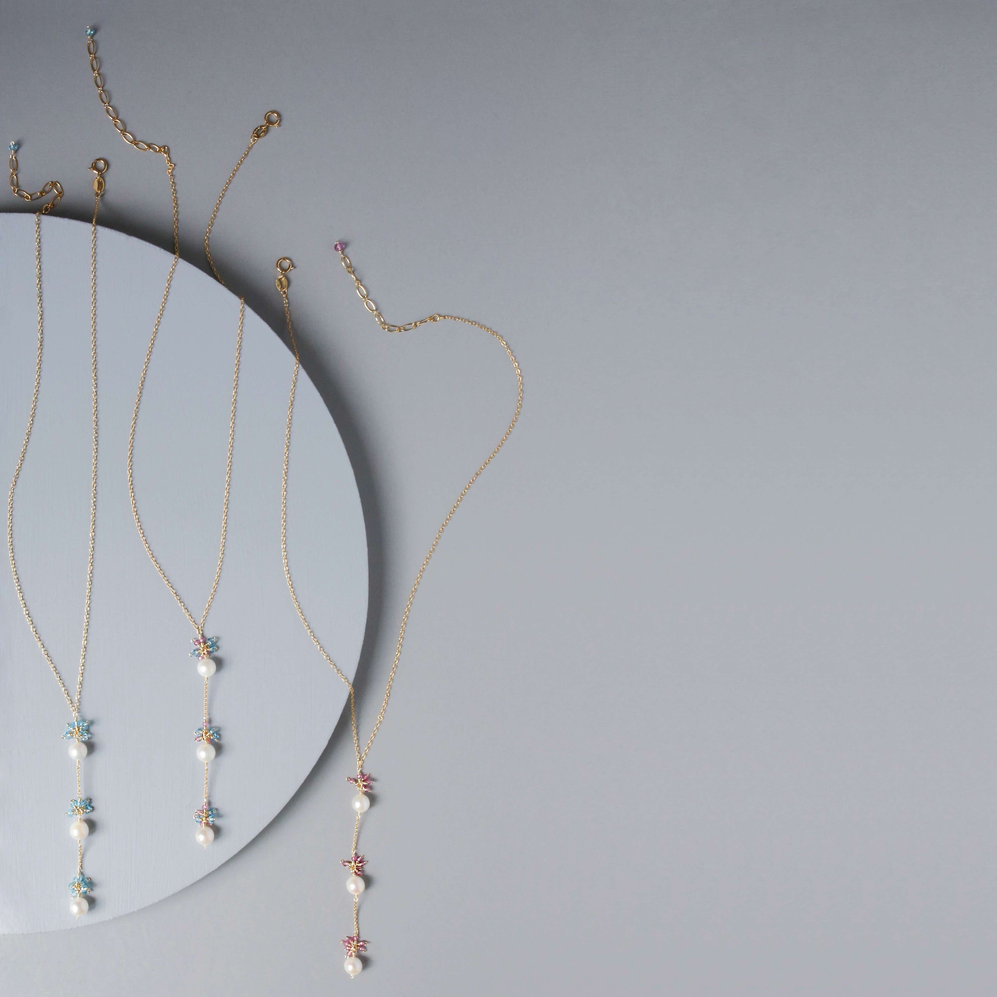Gold plated Necklace with 3 white freshwater bead pearls paired with genuine aquamarine quartz gemstones