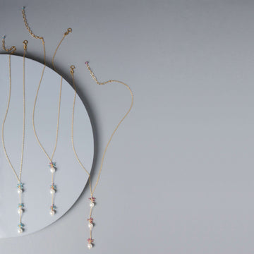 Gold plated Necklace with 3 white freshwater bead pearls paired with genuine aquamarine quartz gemstones