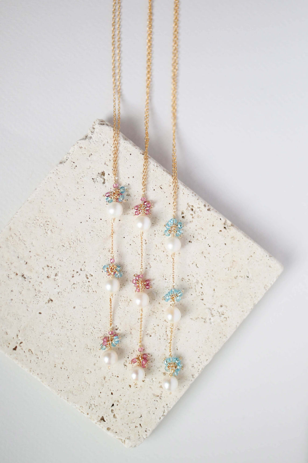 Colorful Gold plated Necklace with 3 white freshwater bead pearls paired with genuine Pink Tourmaline quartz and aquamarine quartz gemstones