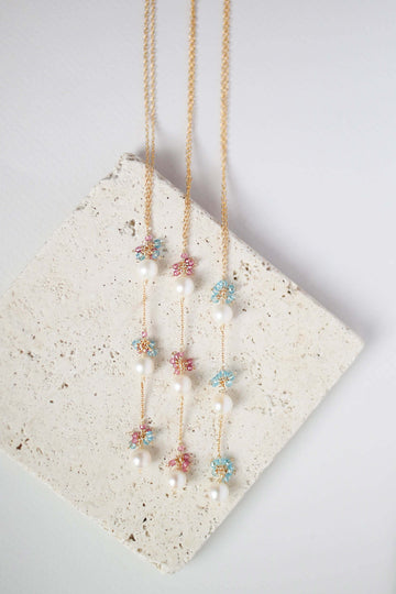 Colorful Gold plated Necklace with 3 white freshwater bead pearls paired with genuine Pink Tourmaline quartz and aquamarine quartz gemstones