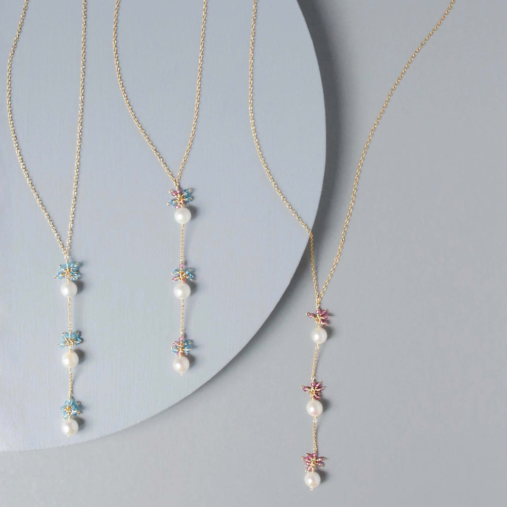 Colorful Gold plated Necklace with 3 white freshwater bead pearls paired with genuine rose quartz and aquamarine quartz gemstones