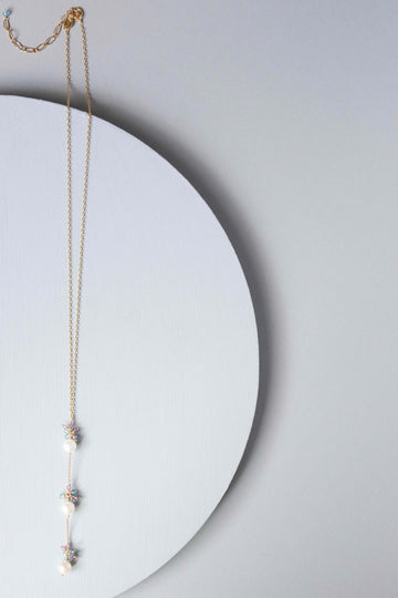 Gold plated Necklace with 3 white freshwater bead pearls paired with genuine aquamarine quartz gemstones