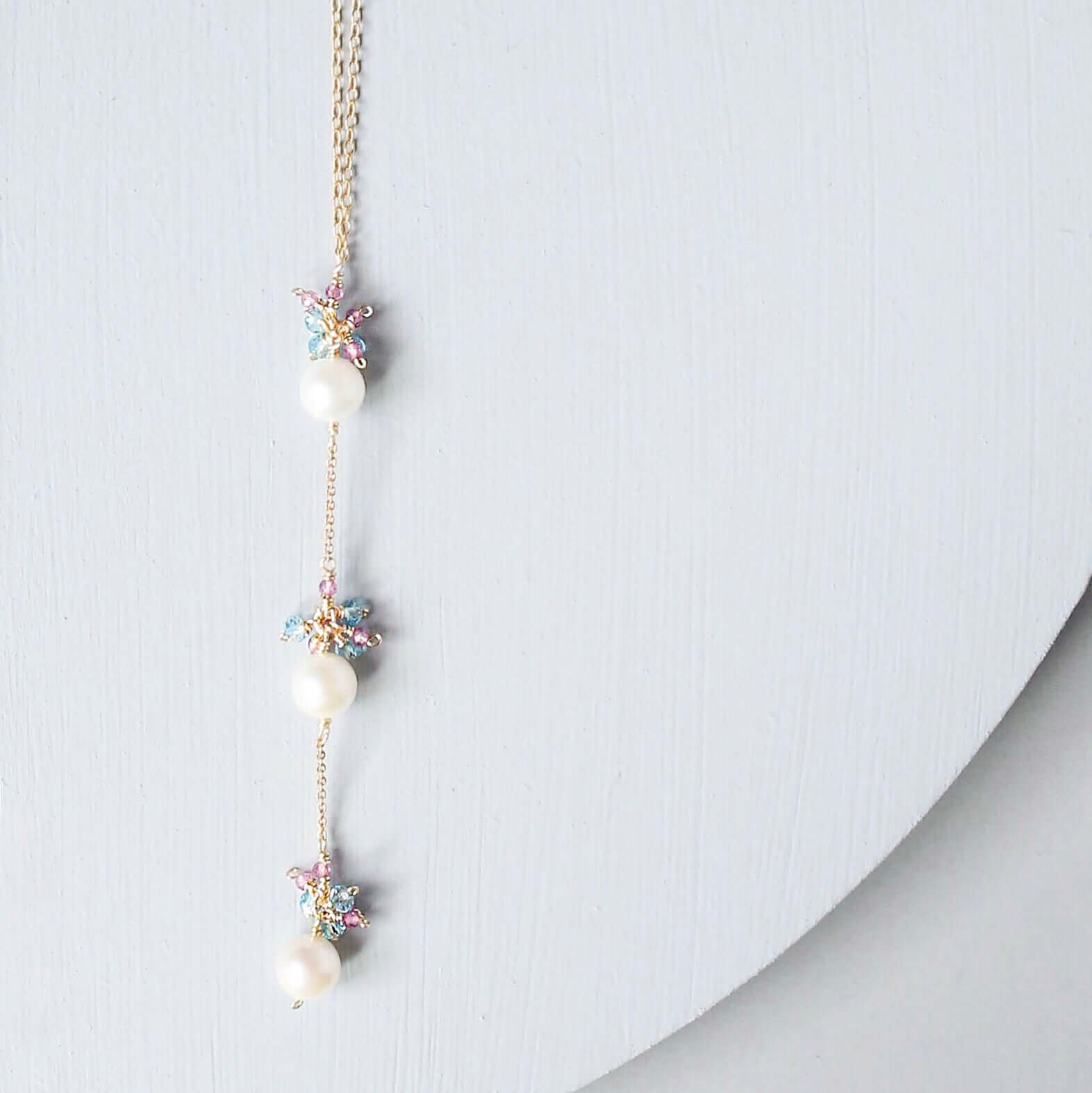 Gold plated Necklace with 3 white freshwater bead pearls paired with genuine Pink Tourmaline quartz and aquamarine quartz gemstones